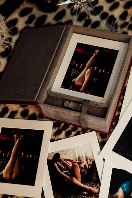 Boudoir photography printed images on leopard rug in Lubbock, Texas photographer in Amarillo TX