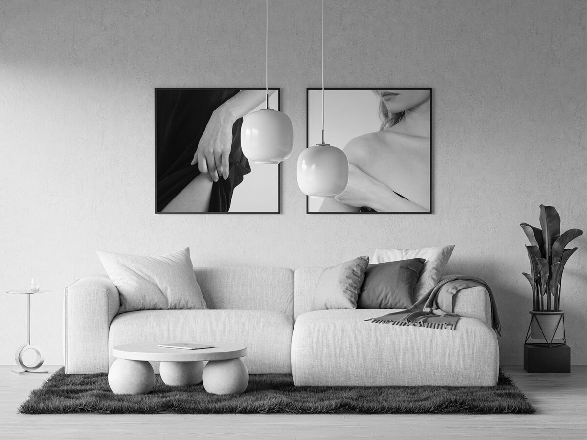 Two framed metal prints on a wall