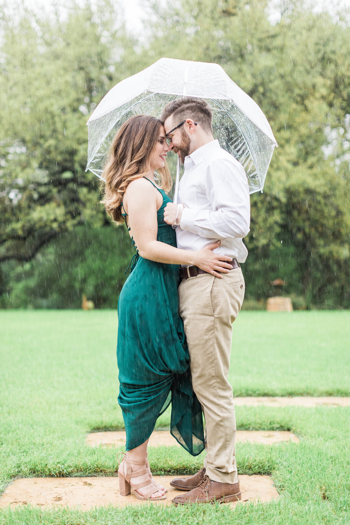 An Engaged Couple in the Rain at Camp Lucy