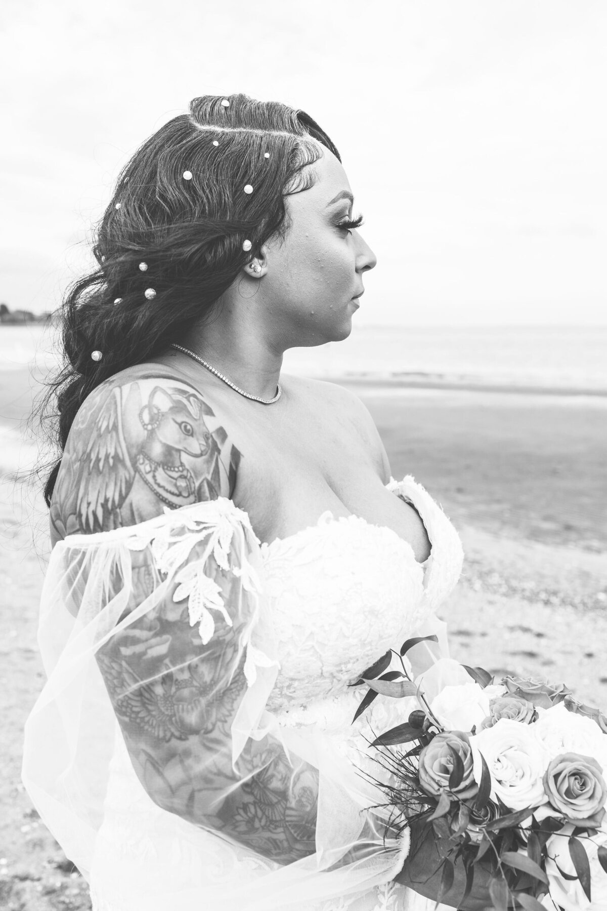 black and white photo of bride deep in thought