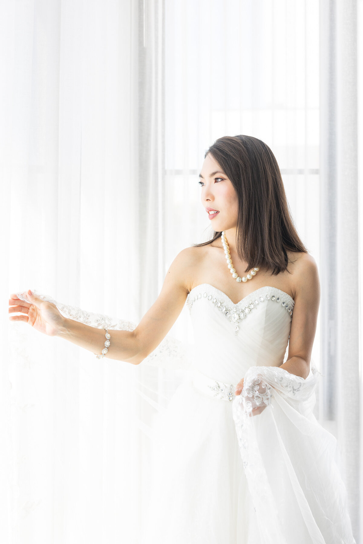 bride looking through the window