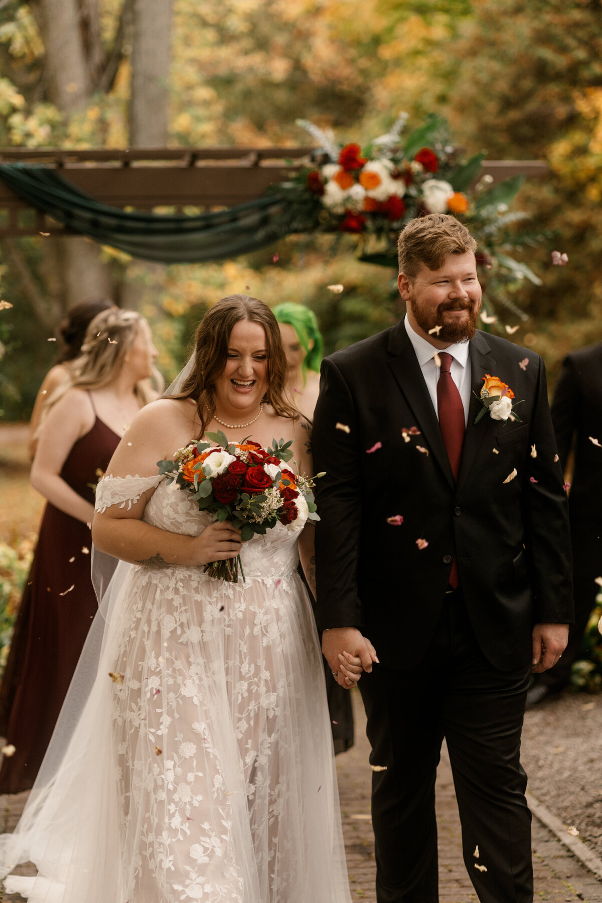 Couple walking down aisle after their elopement in Ontario
