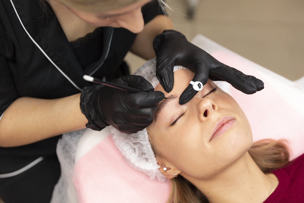 beautiful-young-woman-going-through-microblading-treatment