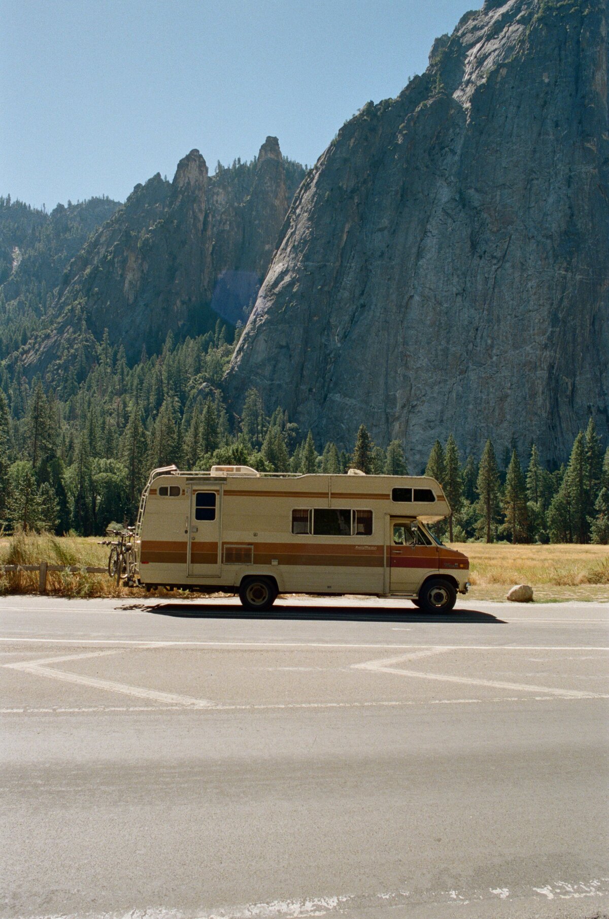 1970s van captured on film by Kate Winters Photography, showcasing a nostalgic and authentic moment in a documentary style.