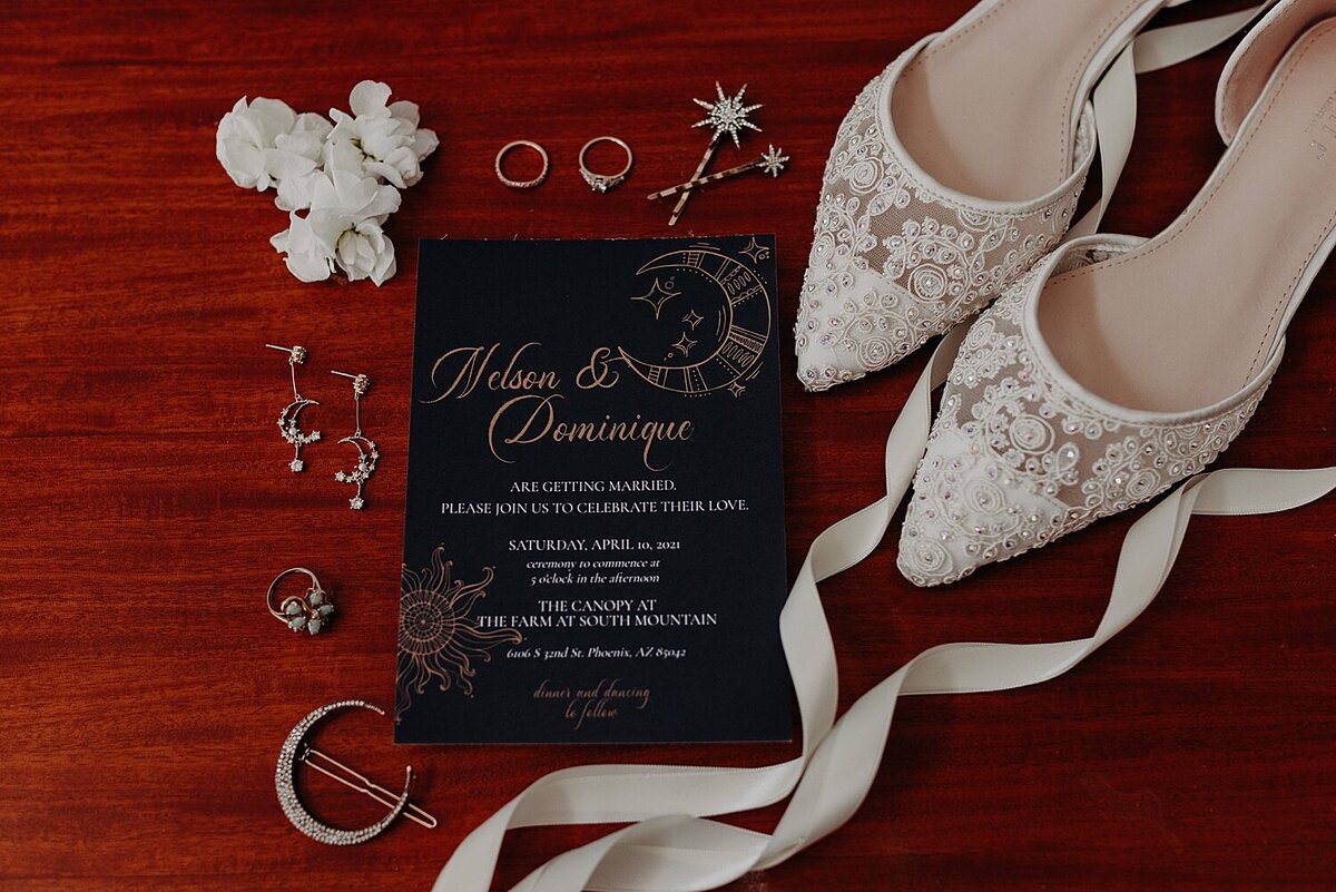 Wedding invitation styled with ballet flats and  jewelry