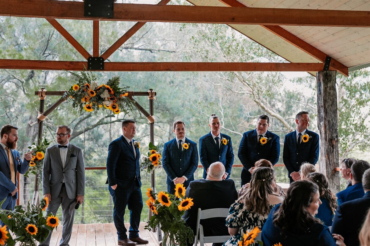 Ben together with his groomsmen and guest waiting for the beautiful bride