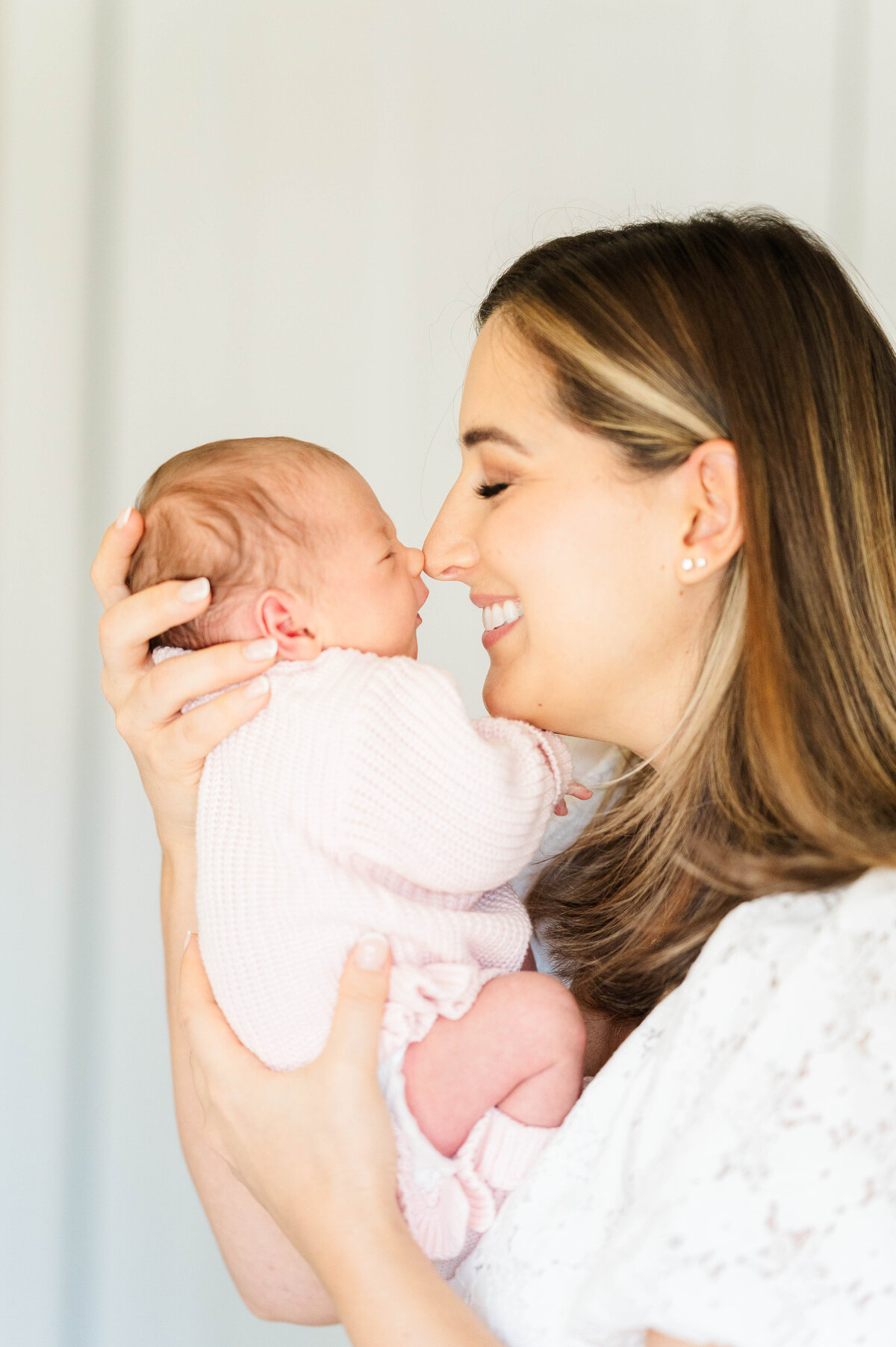 newborn baby girl nose to nose with mom taken in Douglas, MA by the best newborn photographer in central Massachsuetts