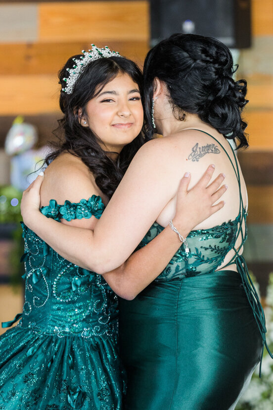 daughter-mother-hug-quinceanera