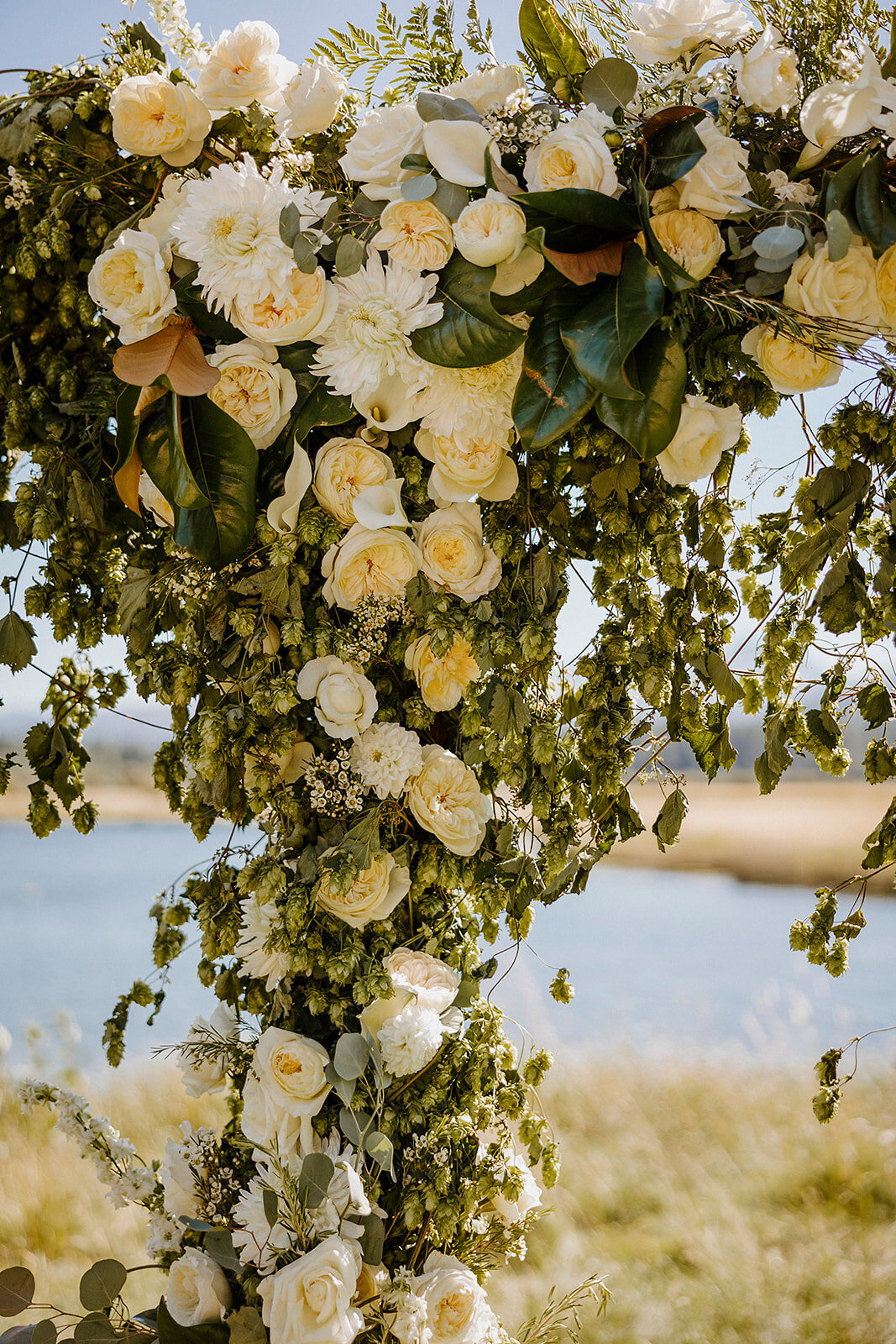 lush green and white arch floral