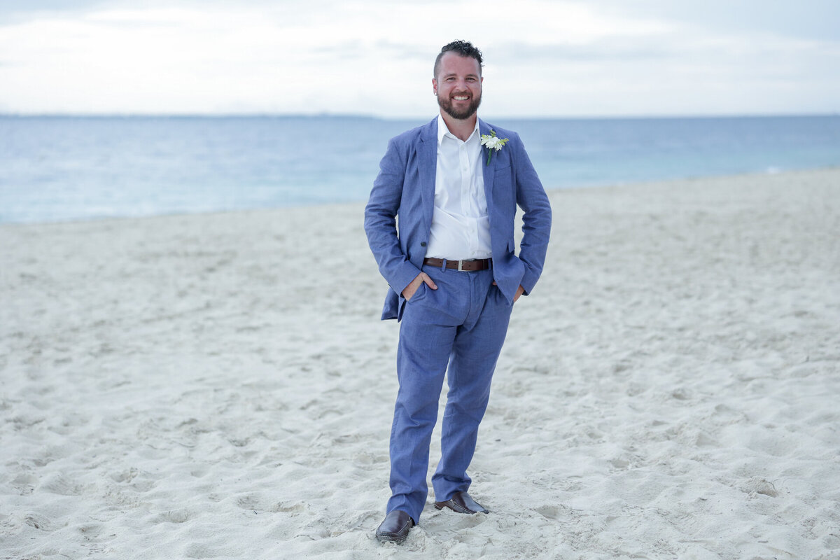groom-on-beach-the-finest-playa-mujeres-mexico-destination-wedding