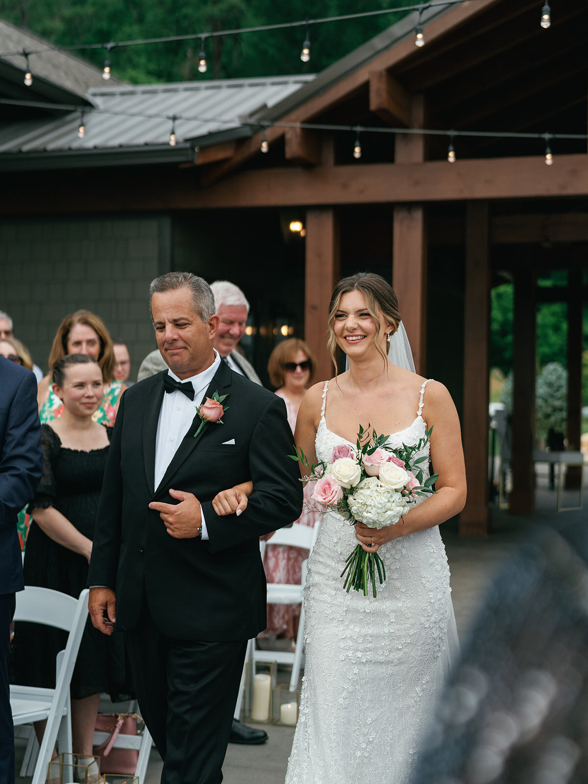 Bride and her father walking down the aisle