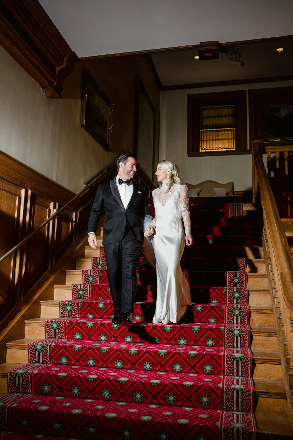 wedding picture on the staircase of the duquesne club