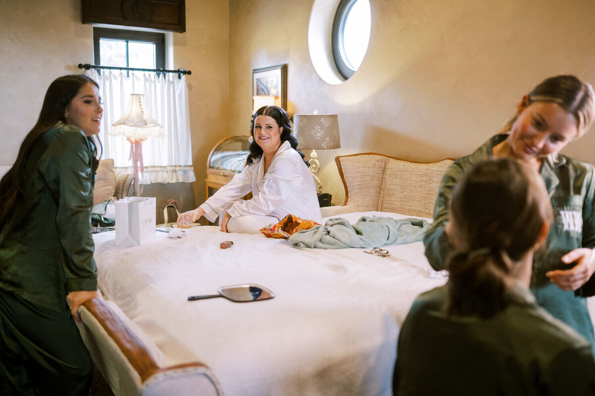 bride-watching-friends-get-ready