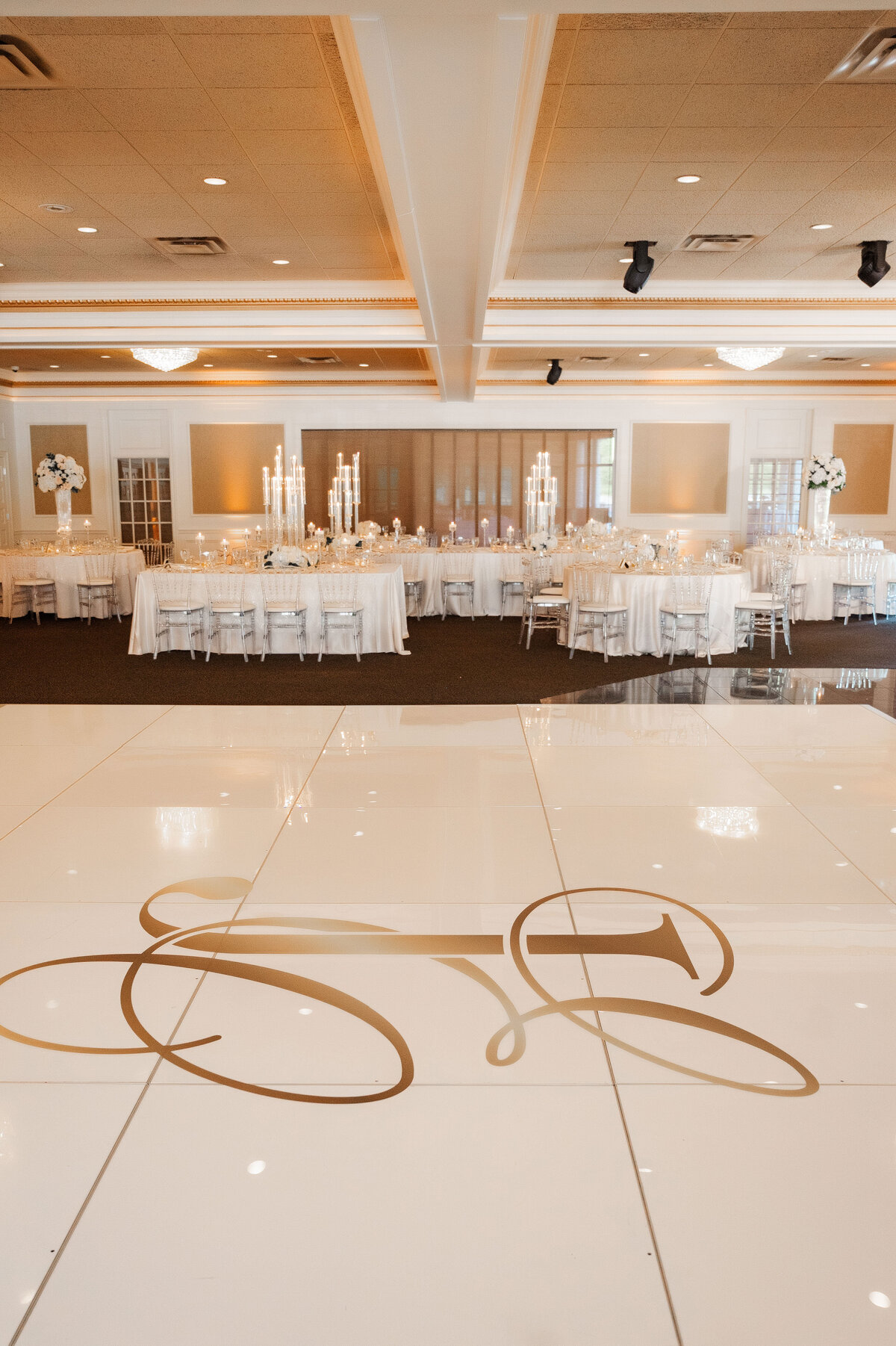 the ballroom with custom white dance floor setup at The Grand Resort in warren ohio