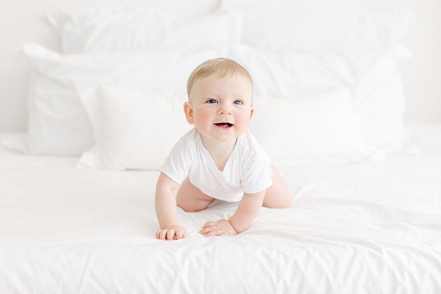 6 month old crawling for milestone portraits
