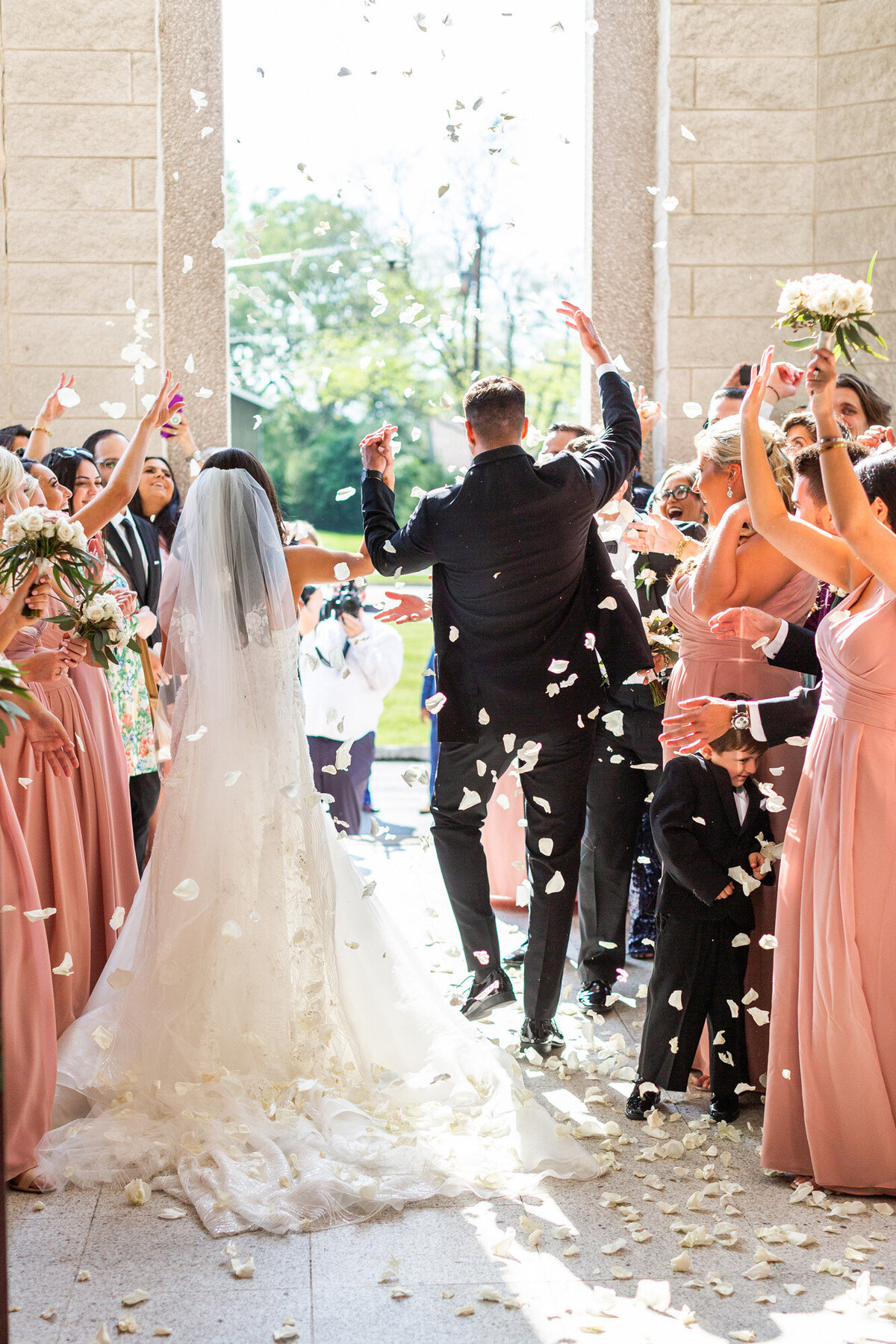 bride and groom walking down aisle at Greek chicago wedding