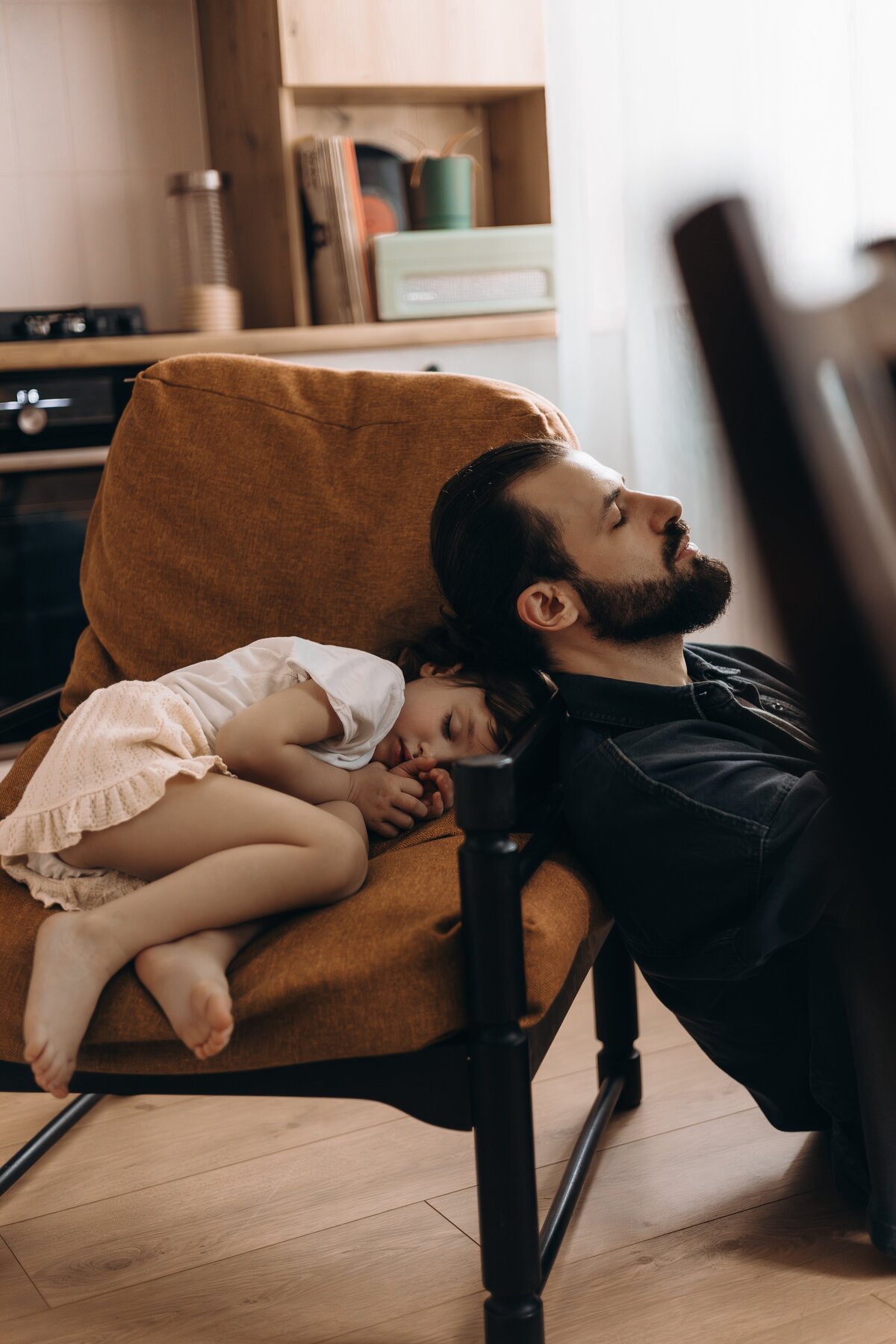 man-woman-are-sleeping-chair