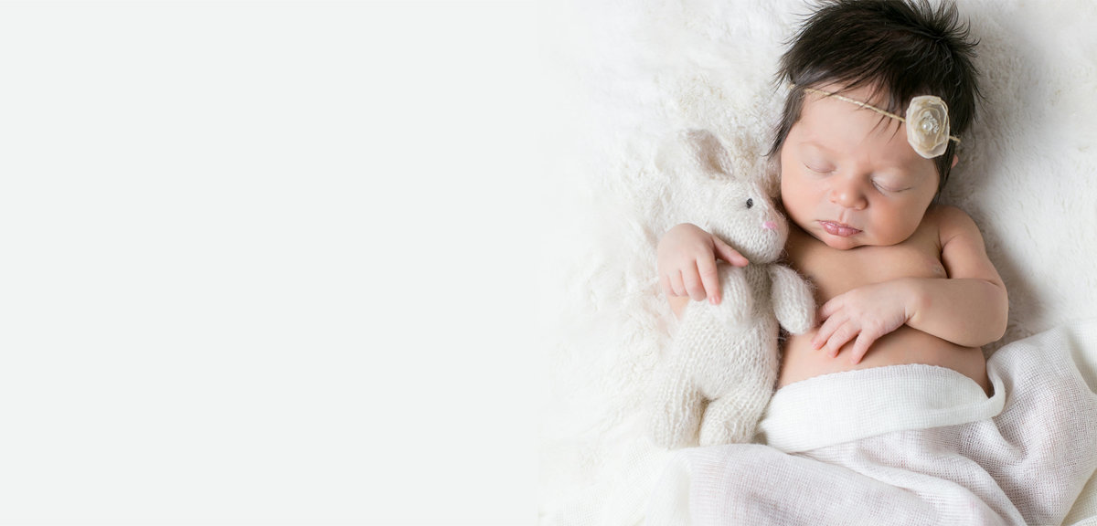 Infant photo shoot of newborn girl