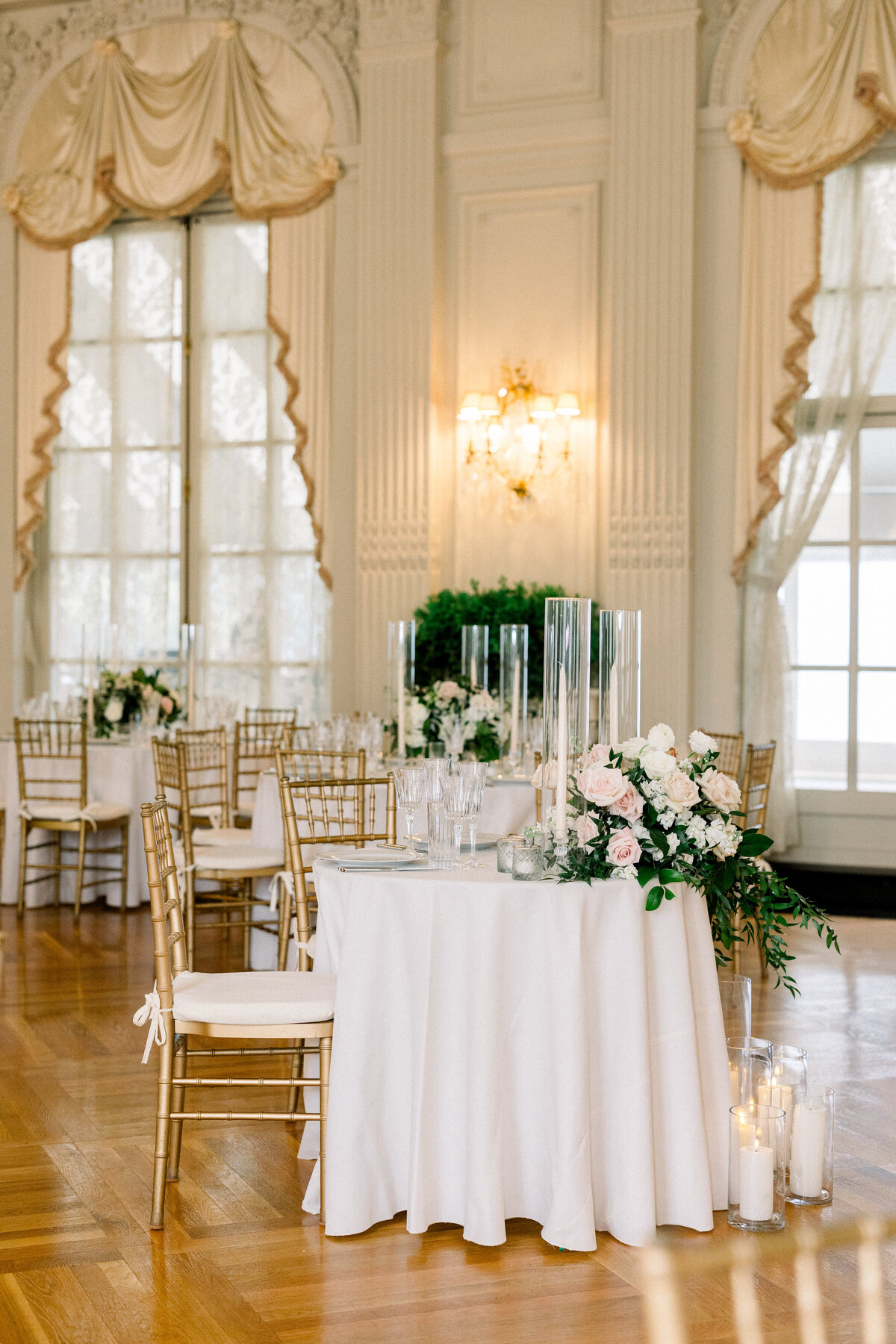 table settings in ballroom of rosecliff mansion in newport rhode island