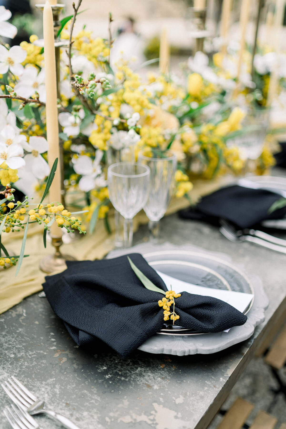 Black and yellow Wedding reception table at Sunstone Winery wedding in Santa Ynez, CA