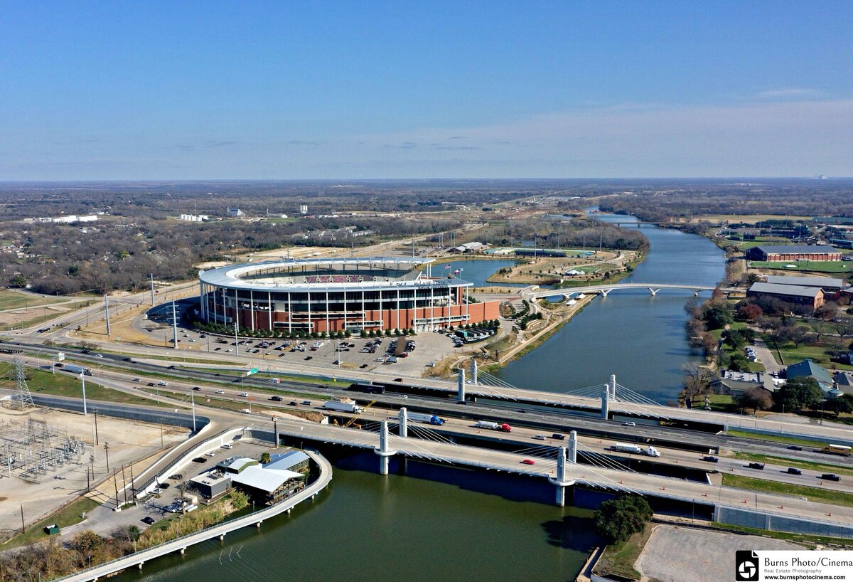 Aerial view of McLane Stadium, located near this three-bedroom, two-bathroom vacation rental house with free Wifi, fully equipped kitchen, office space, and room for six in downtown Waco, TX.