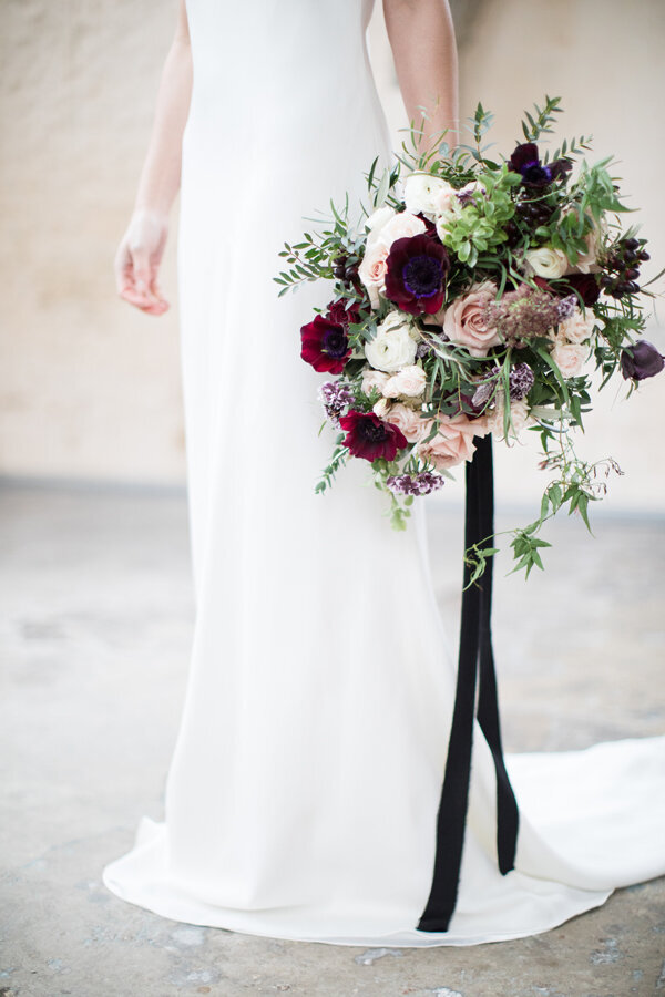 Large bouquet with black trailing ribbons