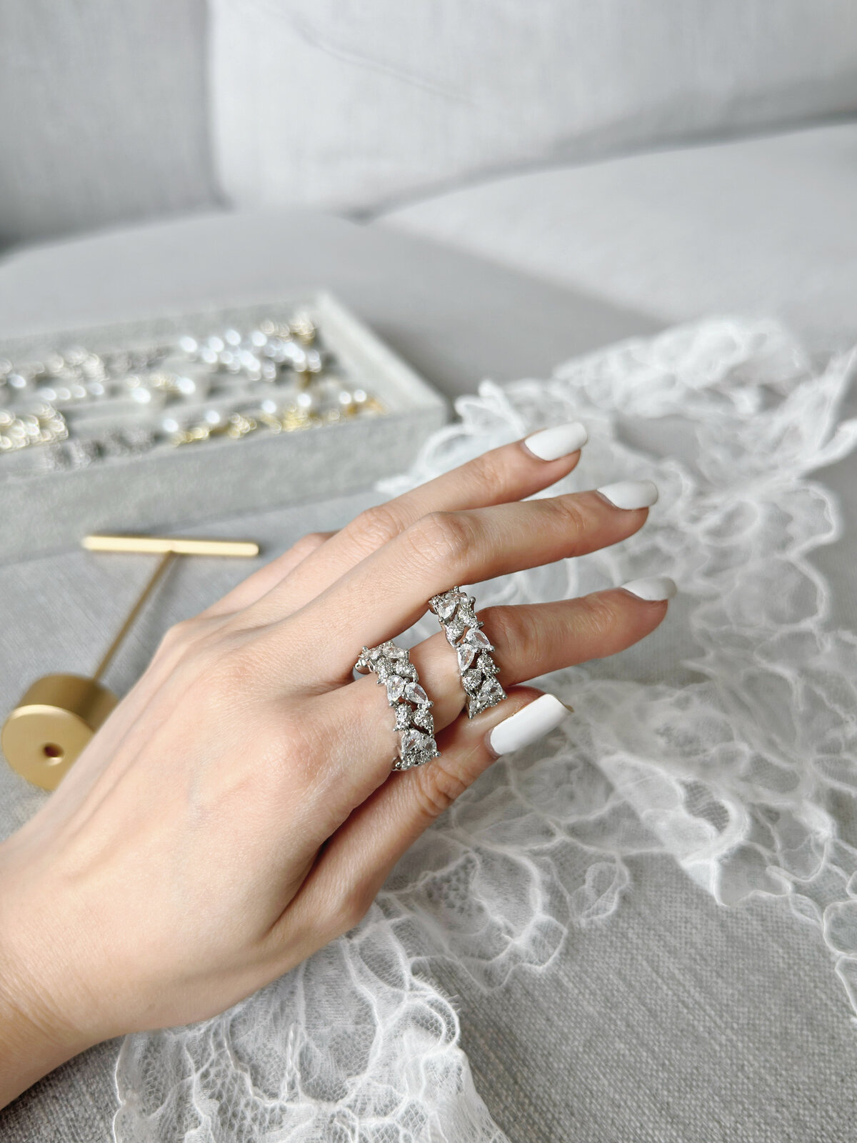 Classic handmade bridal jewelry featuring soft pearls and sparkling crystals