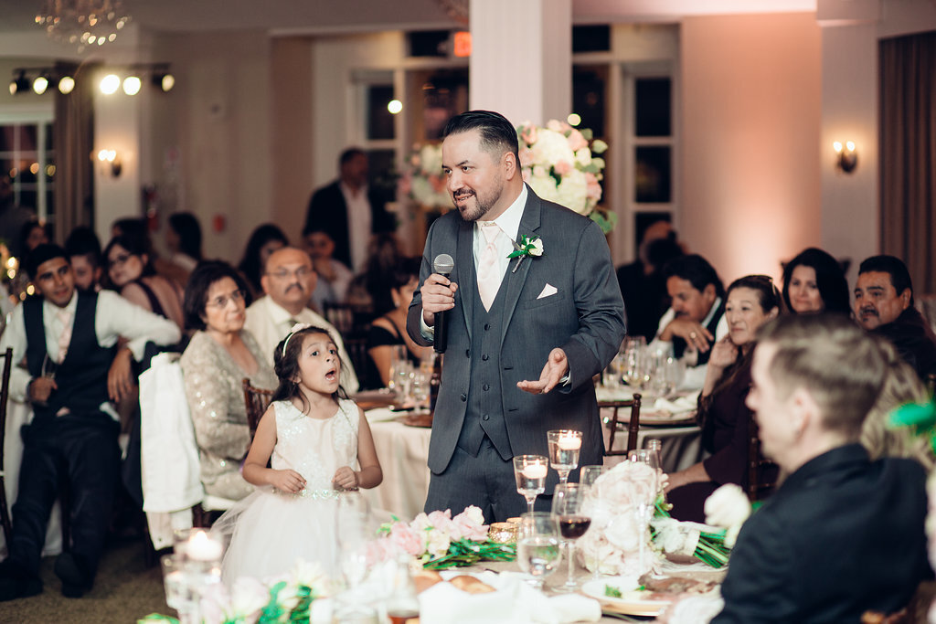 Wedding Photograph Of Visitors Looking At The Man In Gray Suit Speaking In  The Microphone Los Angeles