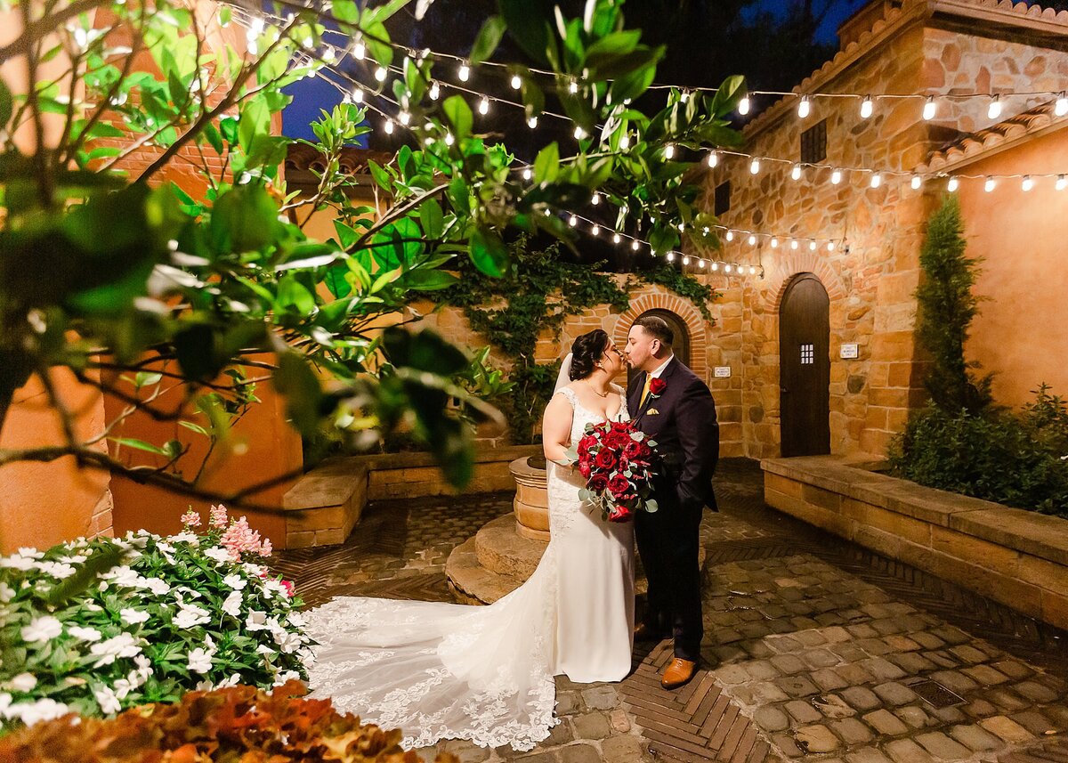 bride and groom under market lights at Italy Pavilion Epcot