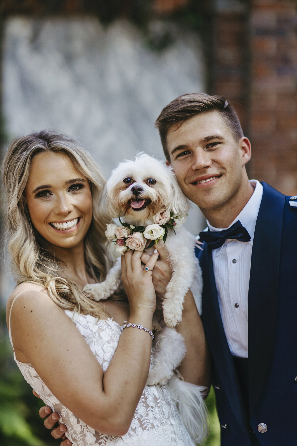 Bride, groom, and the puppy