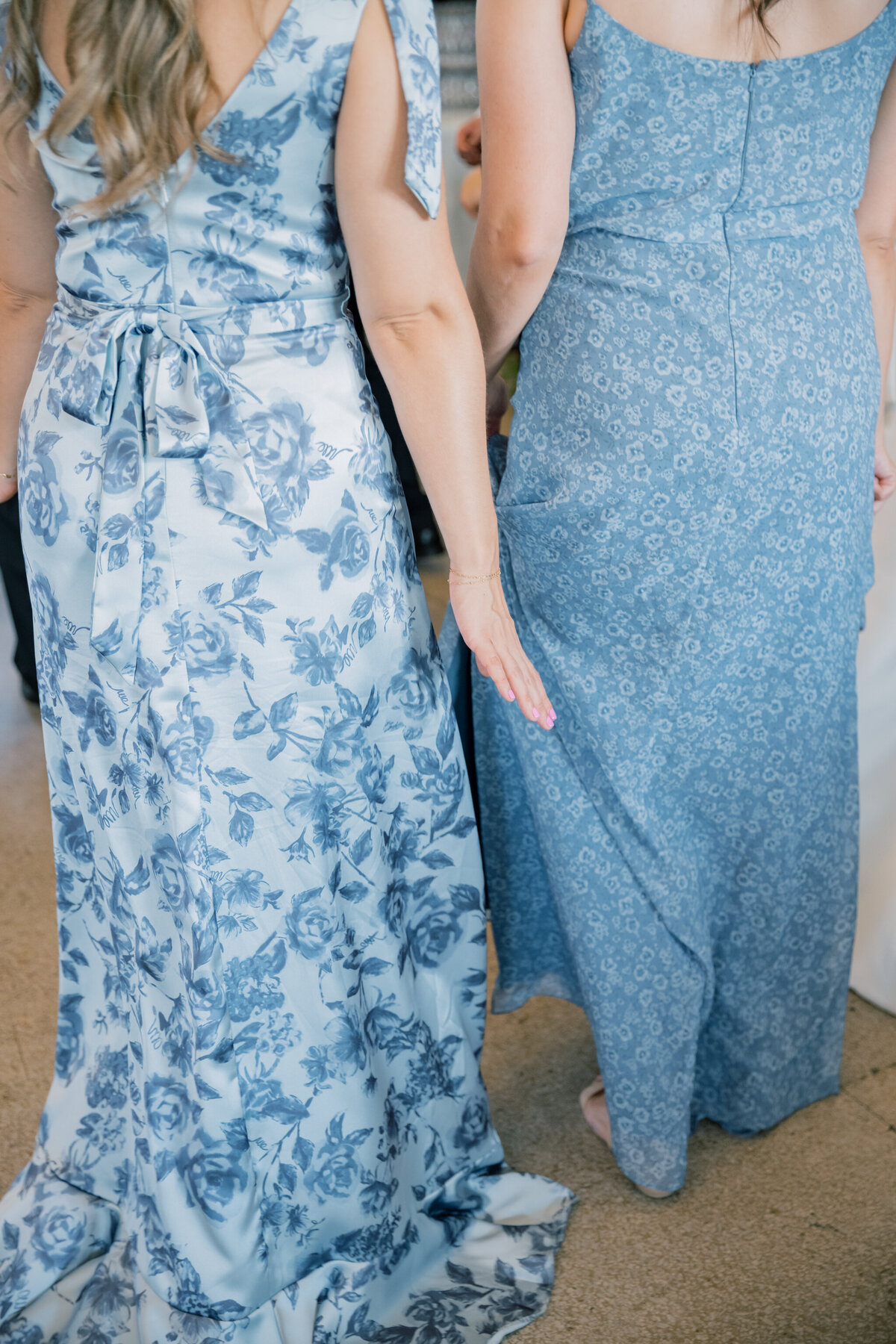 Bristol Train Station Wedding | bridesmaids in blue floral dresses dancing at the wedding reception