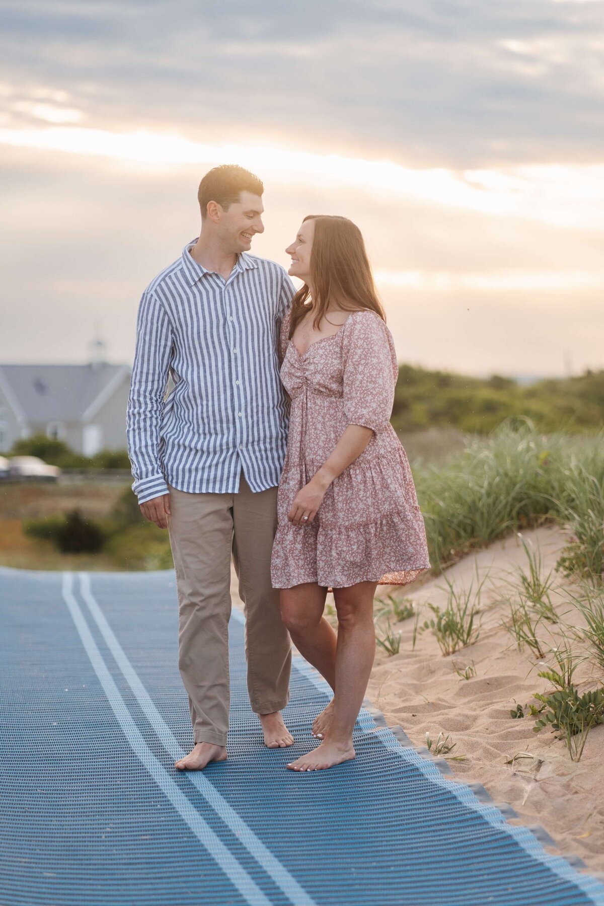 couple getting engagement photos done at plum island beach