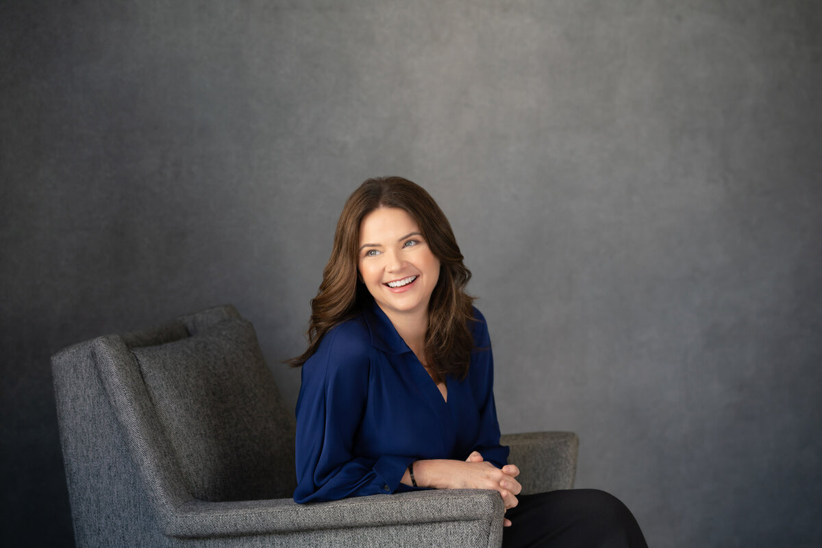 Creative corporate headshot new york woman in blue blouse by Jennifer Lee