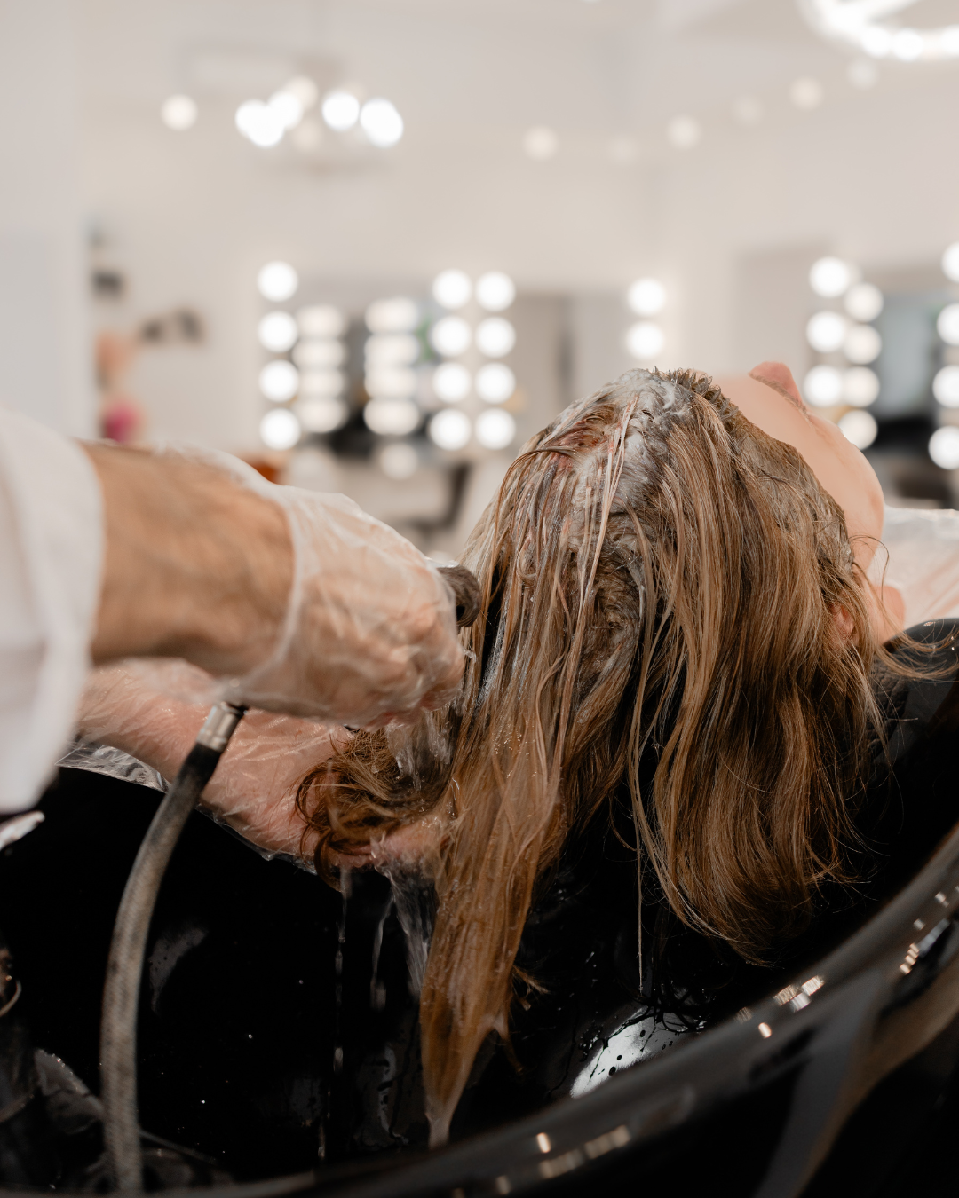 Client's hair being washed