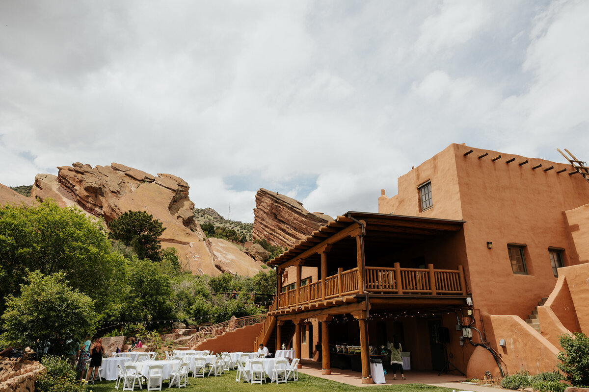 A wide photo of the Red Rocks Trading Post Wedding Venue set up for a wedding.