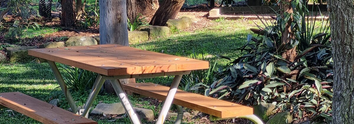 Outdoor picnic seat green acre designs quiet garden seat
