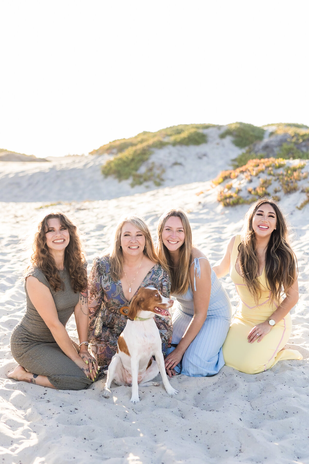 San-Diego-Coronado-Family-Photo-Session-women-kneeling-in-sand-dunes