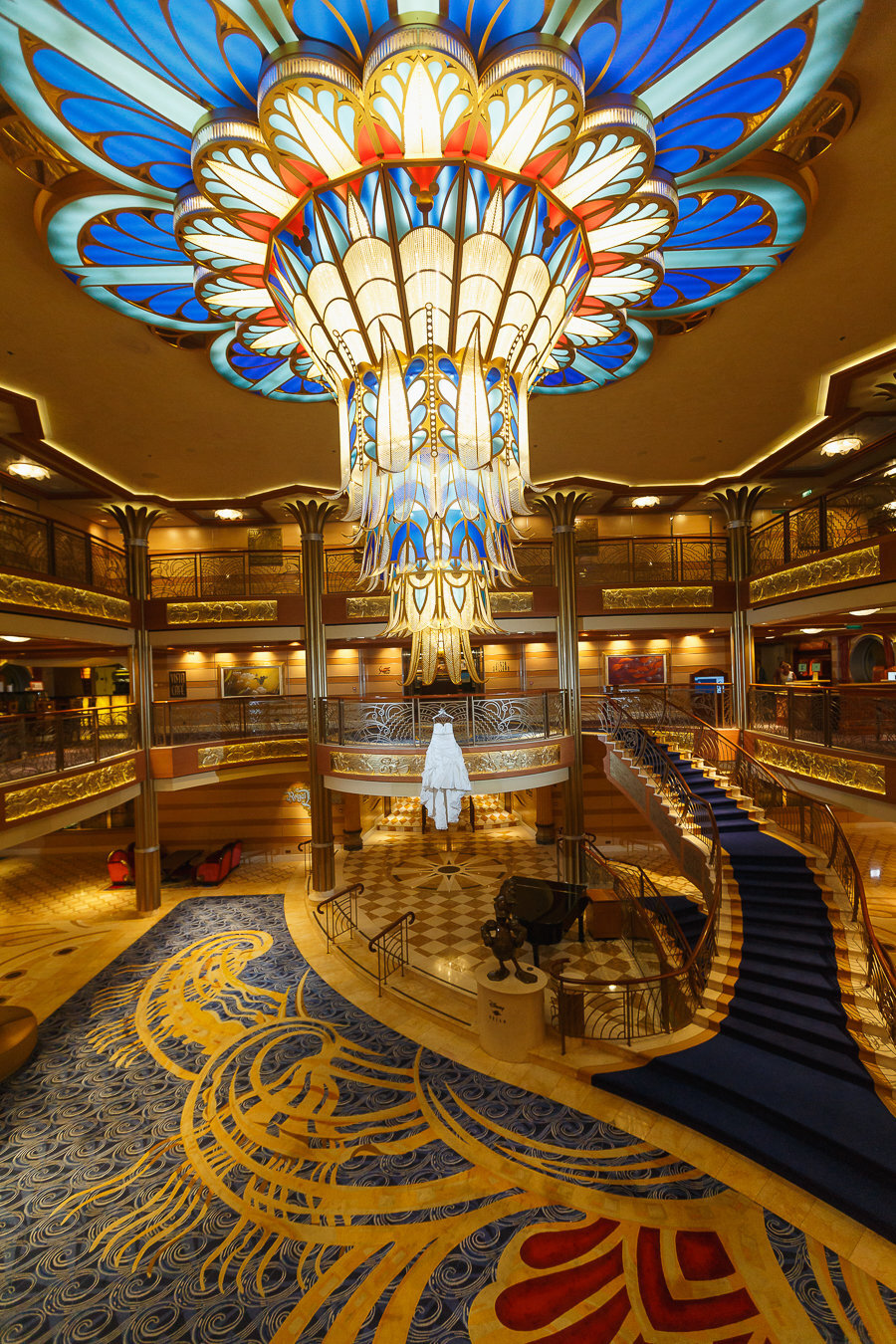 Dress hanging in grand atrium on the Disney Dream Cruise Ship.