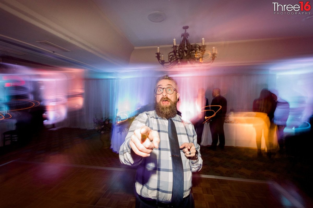 Man dancing on wedding reception