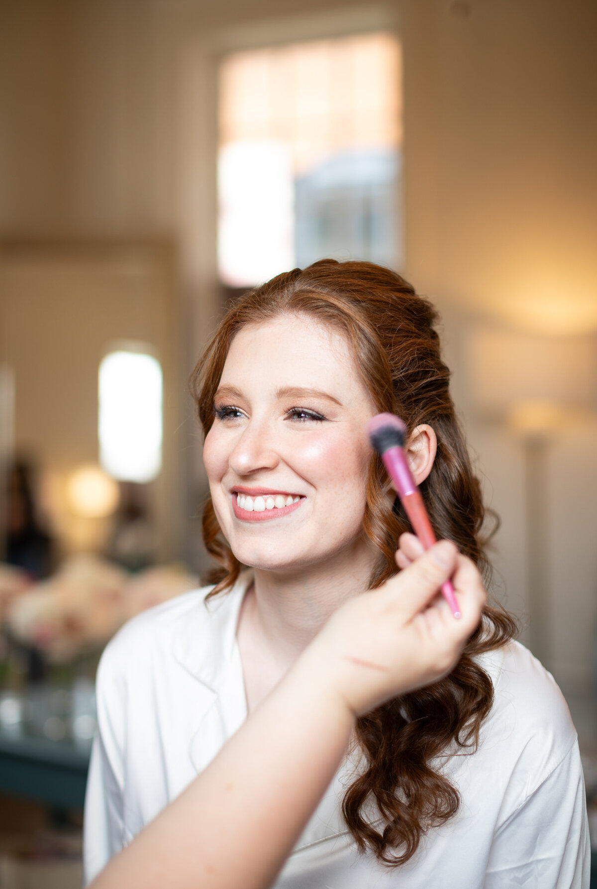 On-location hair and makeup services tailored to your unique bridal vision. Available in Athens, Atlanta, and Augusta, GA, for unforgettable wedding day beauty.