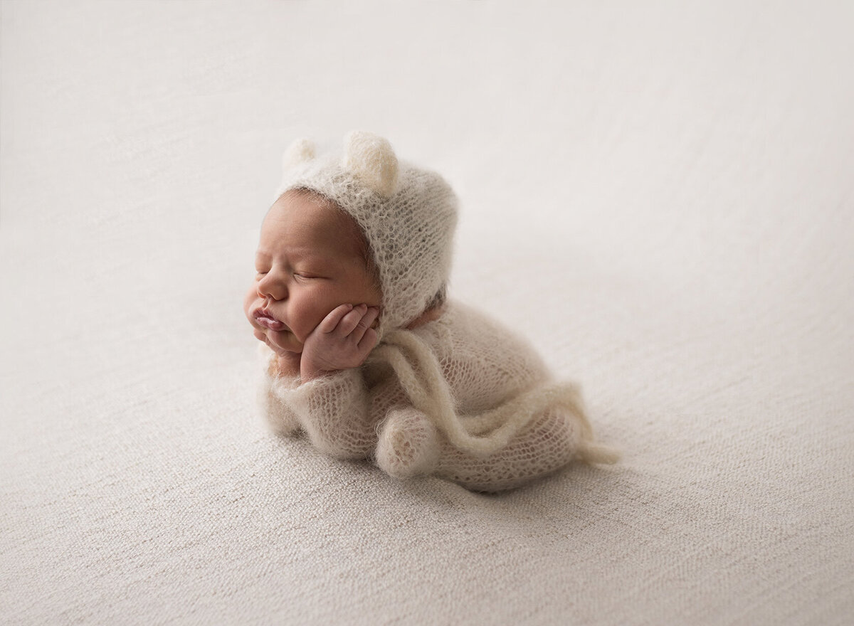 Newborn Chin on Hands Photos by Laura King Photography
