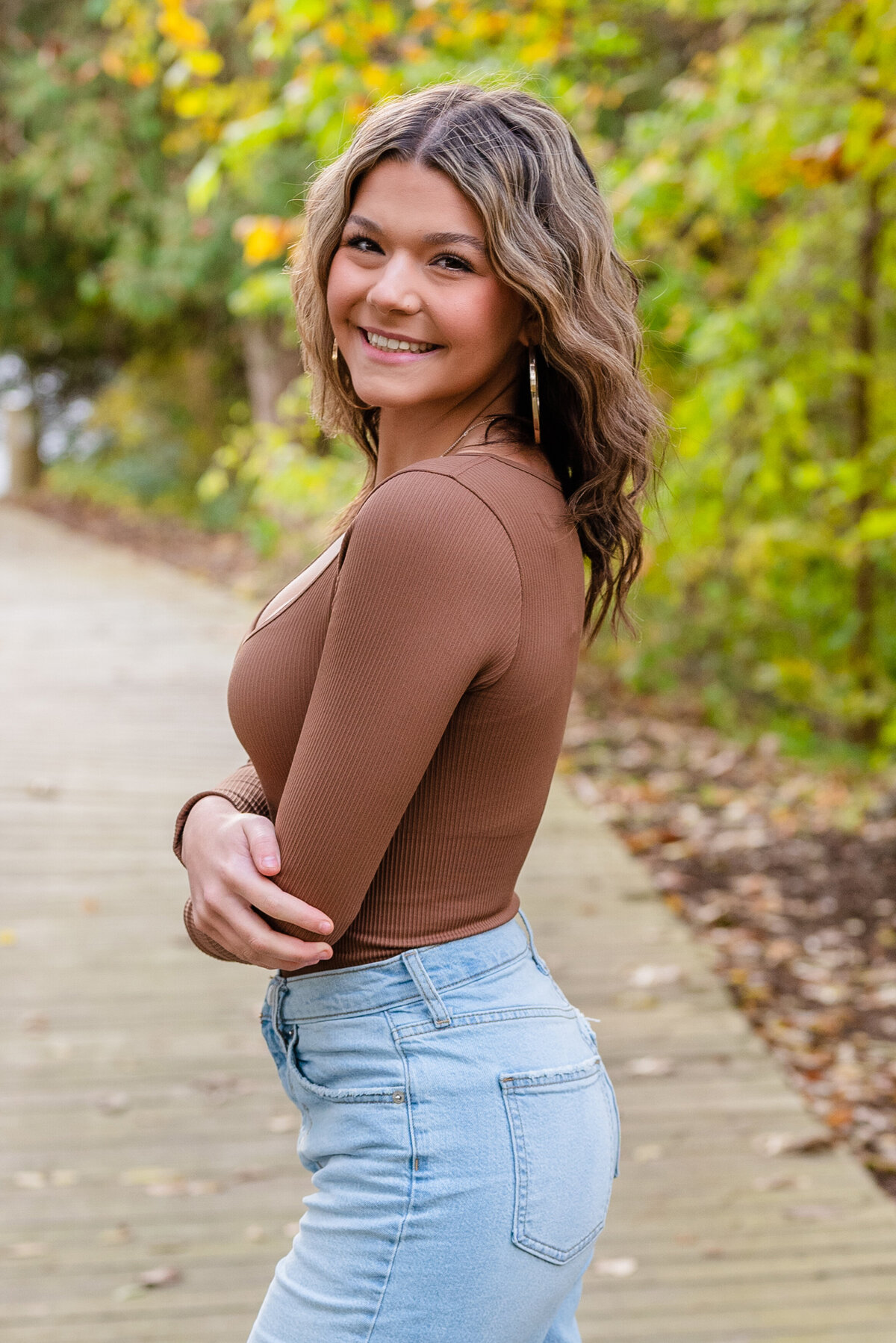brunette-senior-girl-smiling-headshot