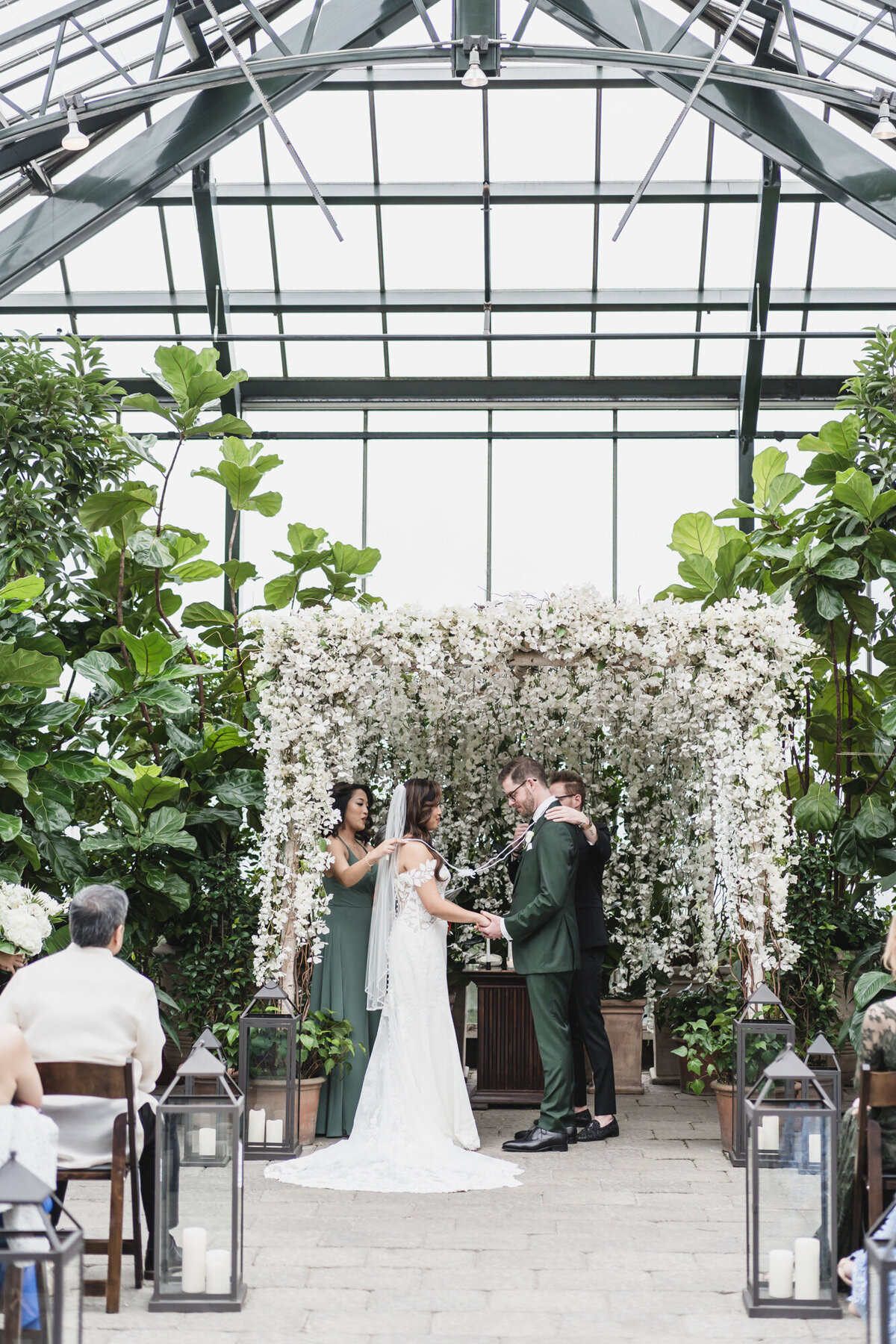 A MAGICAL WINTER PLANTERRA GARDEN WEDDING WITH A GREEN COLOR PALETTE IN WEST BLOOMFIELD, MICHIGAN PROVIDED BY KARI DAWSON PHOTOGRAPHY63