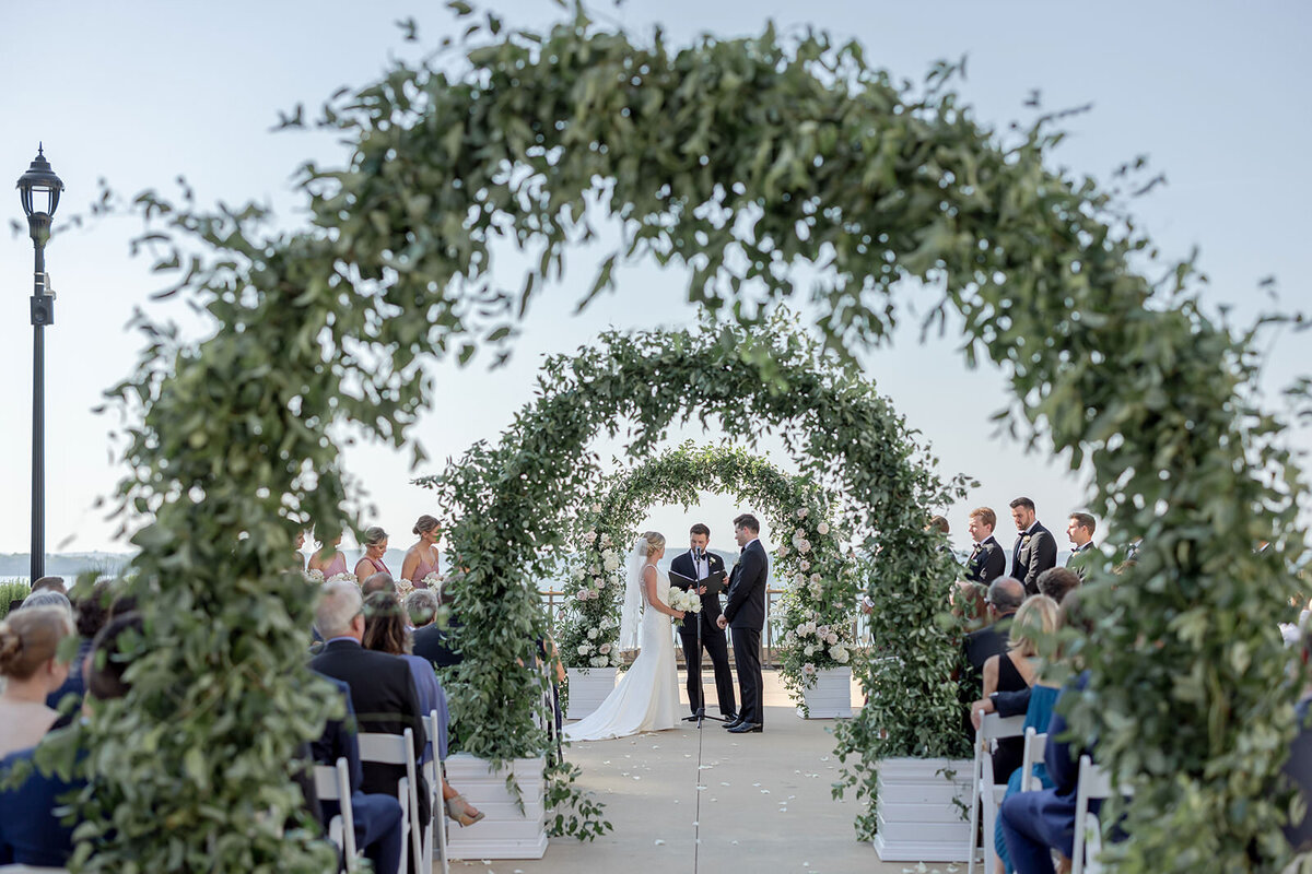 edgewater-outdoor-wedding-ceremony-luxe-garden-arches