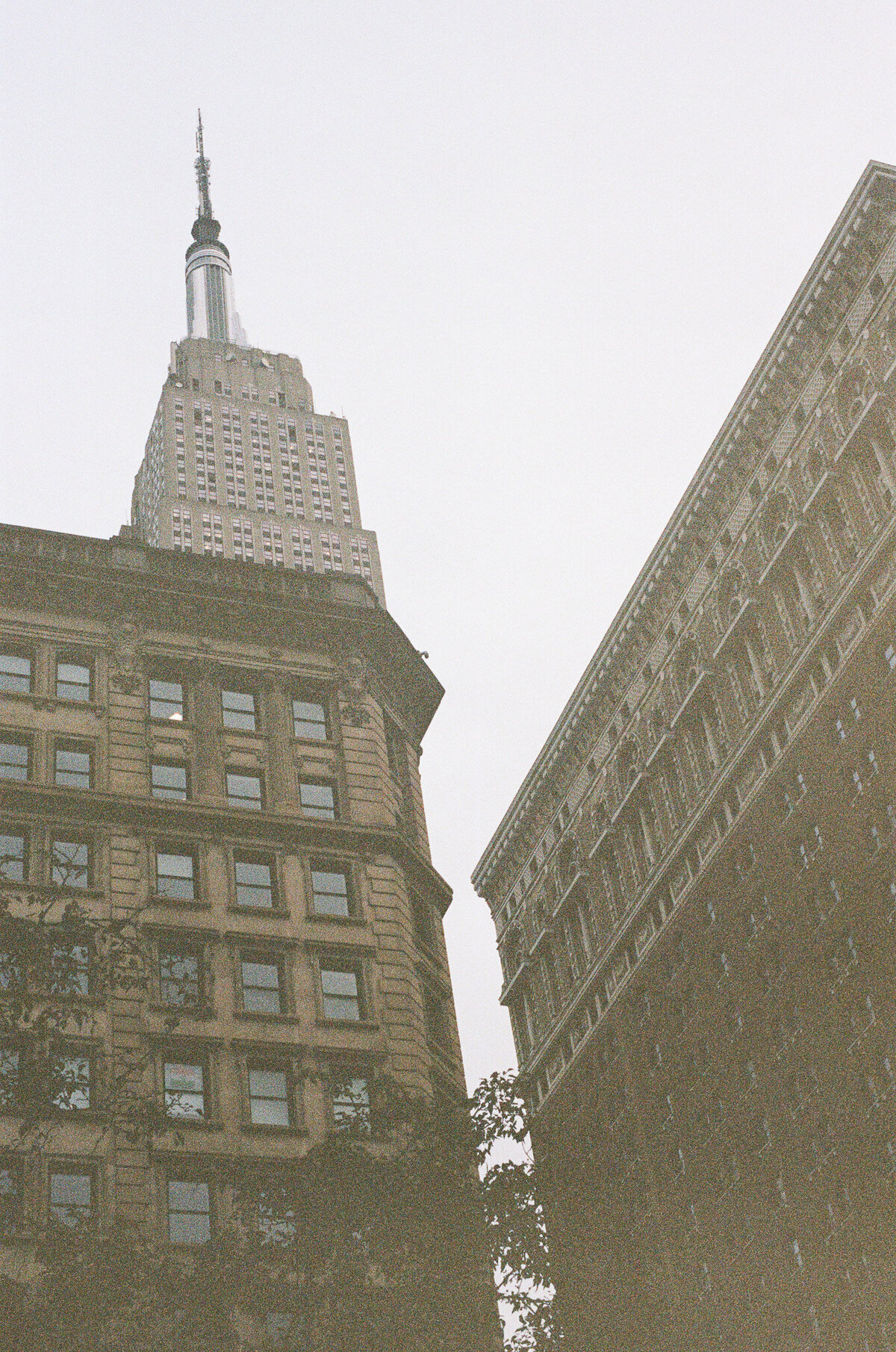 Downtown New York City buildings shot on film by New York wedding photographer. 