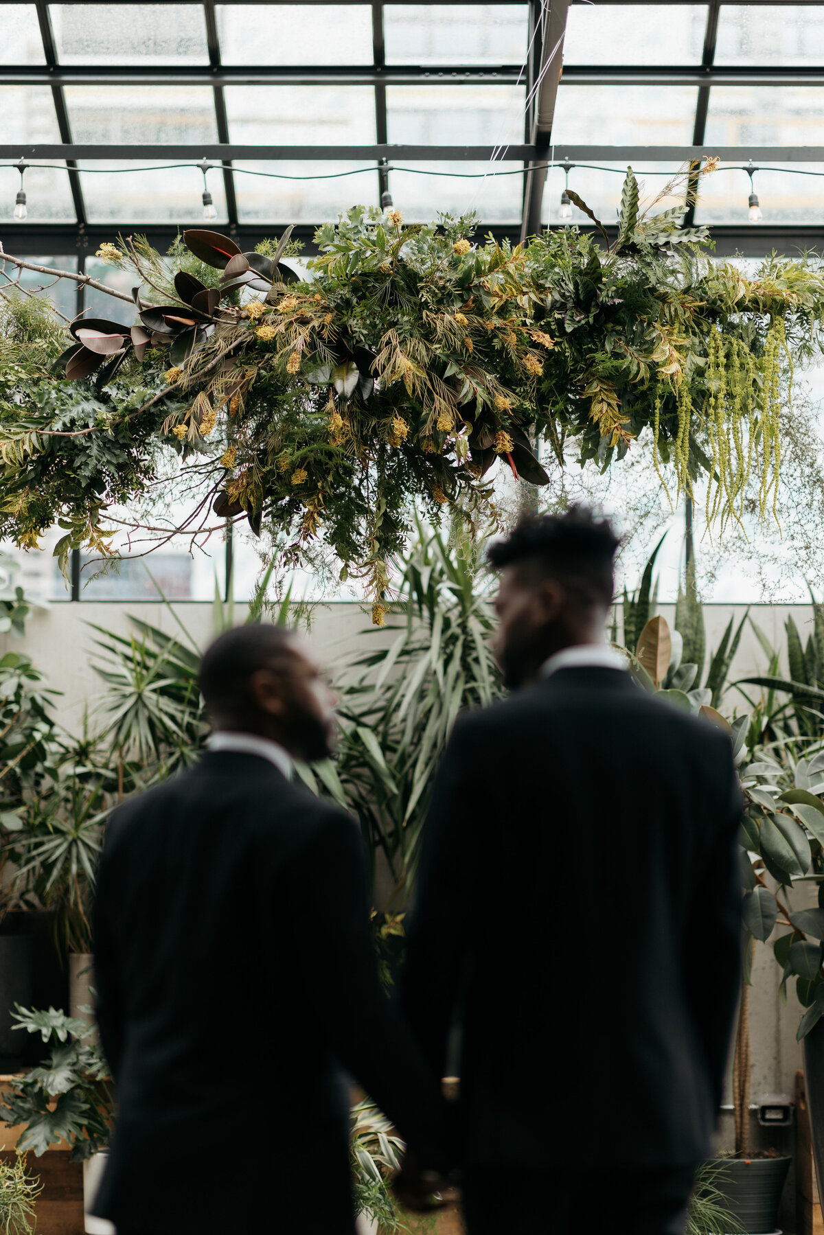 A greenhouse wedding near Milwaukee with Wanderlynn Photography and Daffodil Parker