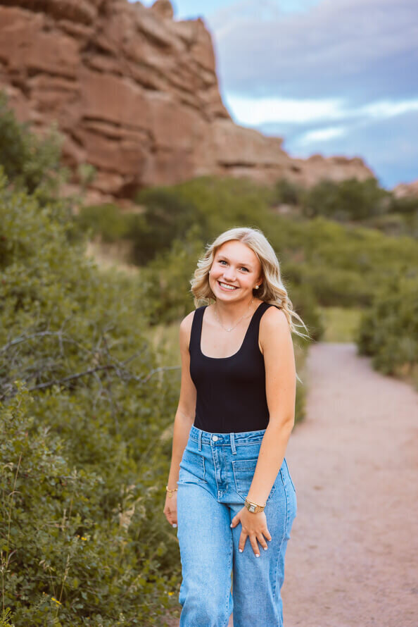 Girl walk along path in Denver, Colorado.