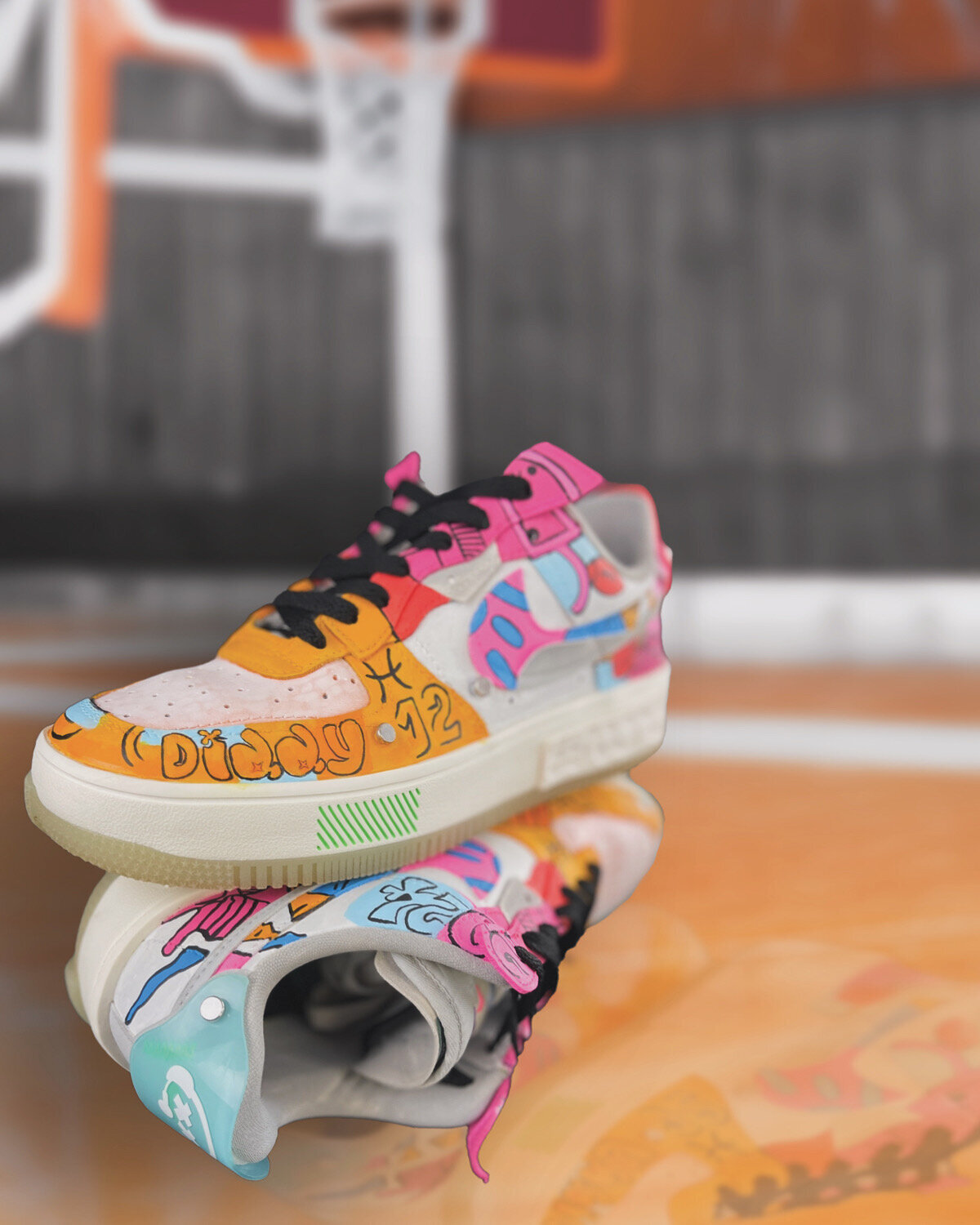 Sneakers custom painted in a brightly colored graffiti style 