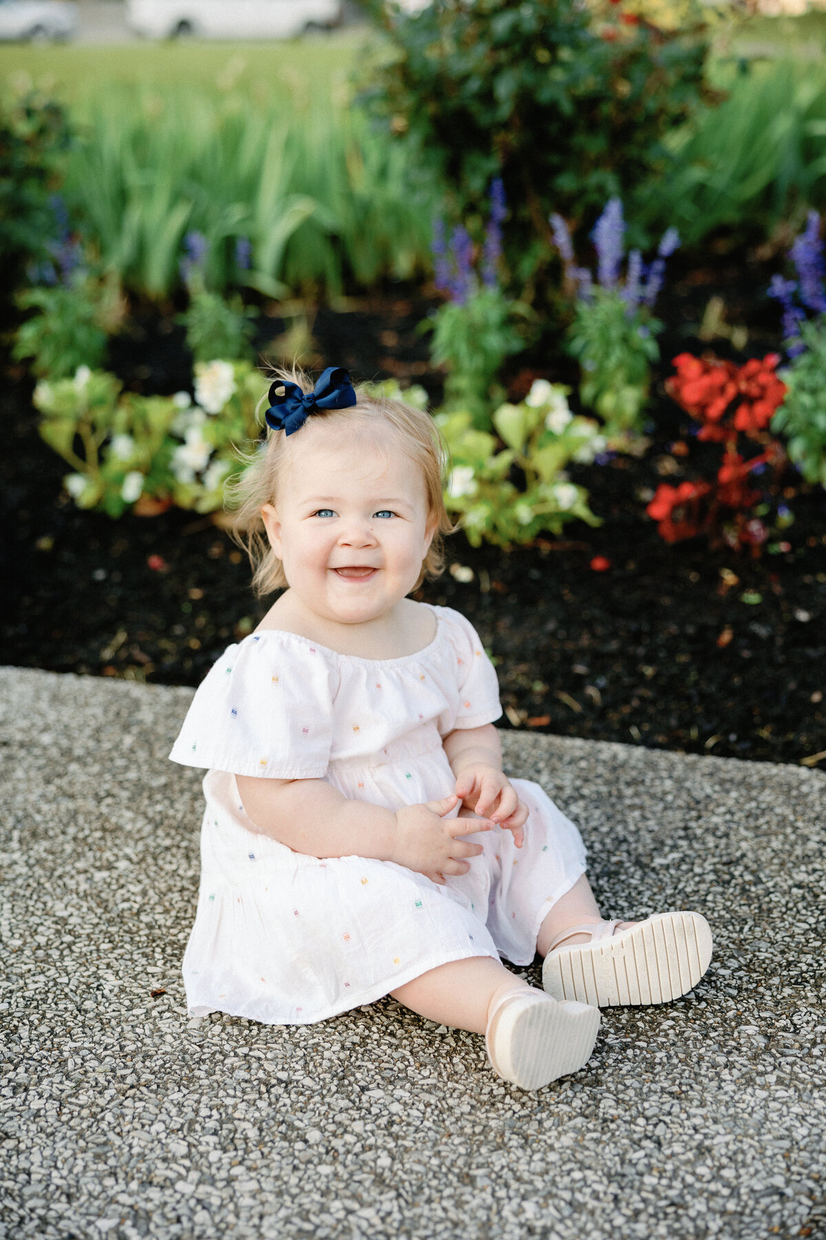 chunky baby girl smiling at the camera