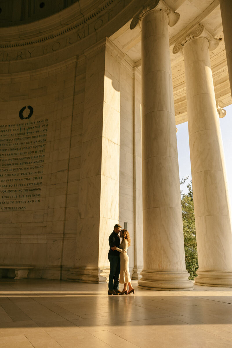 A sunrise engagement session at the Jefferson Memorial